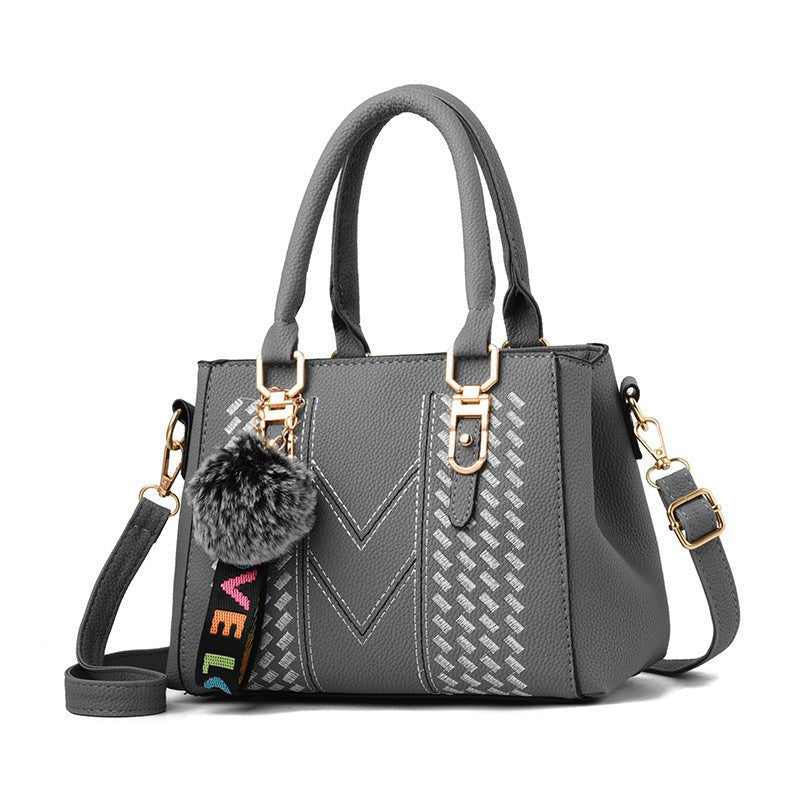Handbag embroidery - Krosscanada