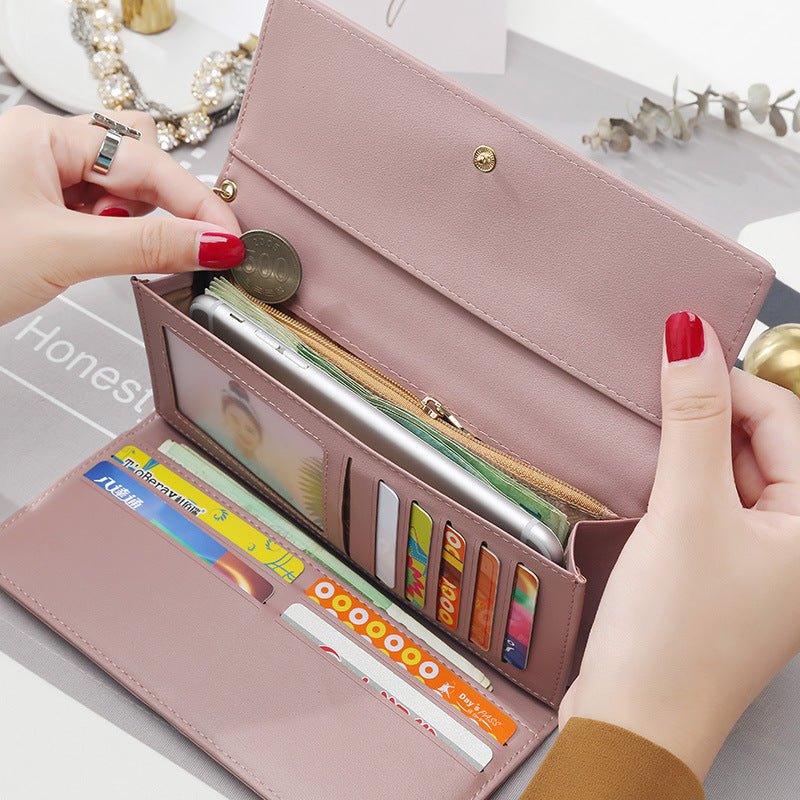 Women's hand holding wallet female long section 2021 new Japanese and Korean personality pendant multi - function student wallet - Krosscanada