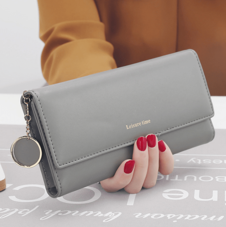 Women's hand holding wallet female long section 2021 new Japanese and Korean personality pendant multi - function student wallet - Krosscanada