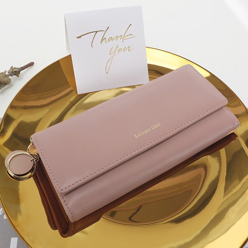 Women's hand holding wallet female long section 2021 new Japanese and Korean personality pendant multi - function student wallet - Krosscanada