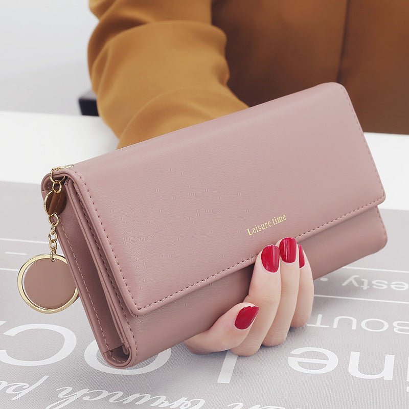 Women's hand holding wallet female long section 2021 new Japanese and Korean personality pendant multi - function student wallet - Krosscanada
