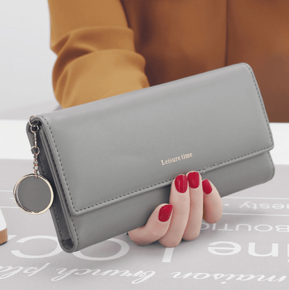 Women's hand holding wallet female long section 2021 new Japanese and Korean personality pendant multi - function student wallet - Krosscanada