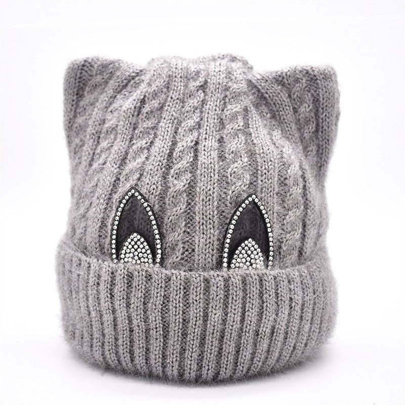Women's winter knitted hat - Krosscanada
